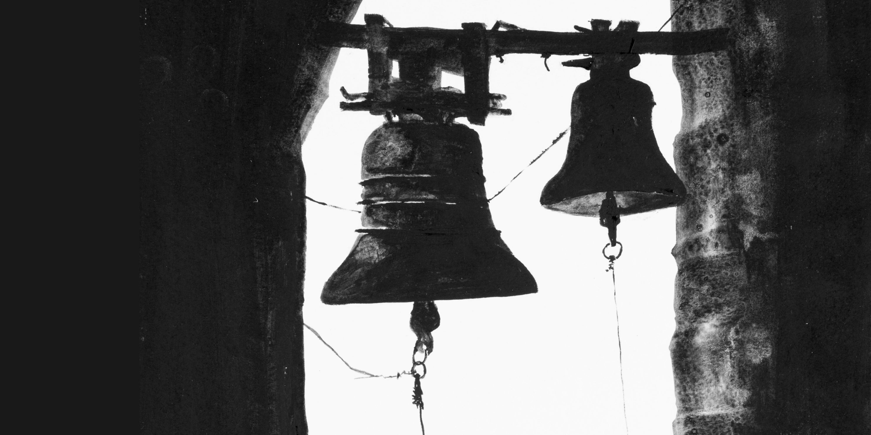 Two bells hanging from a wooden structure against a dark background by Rita Rawashdeh
